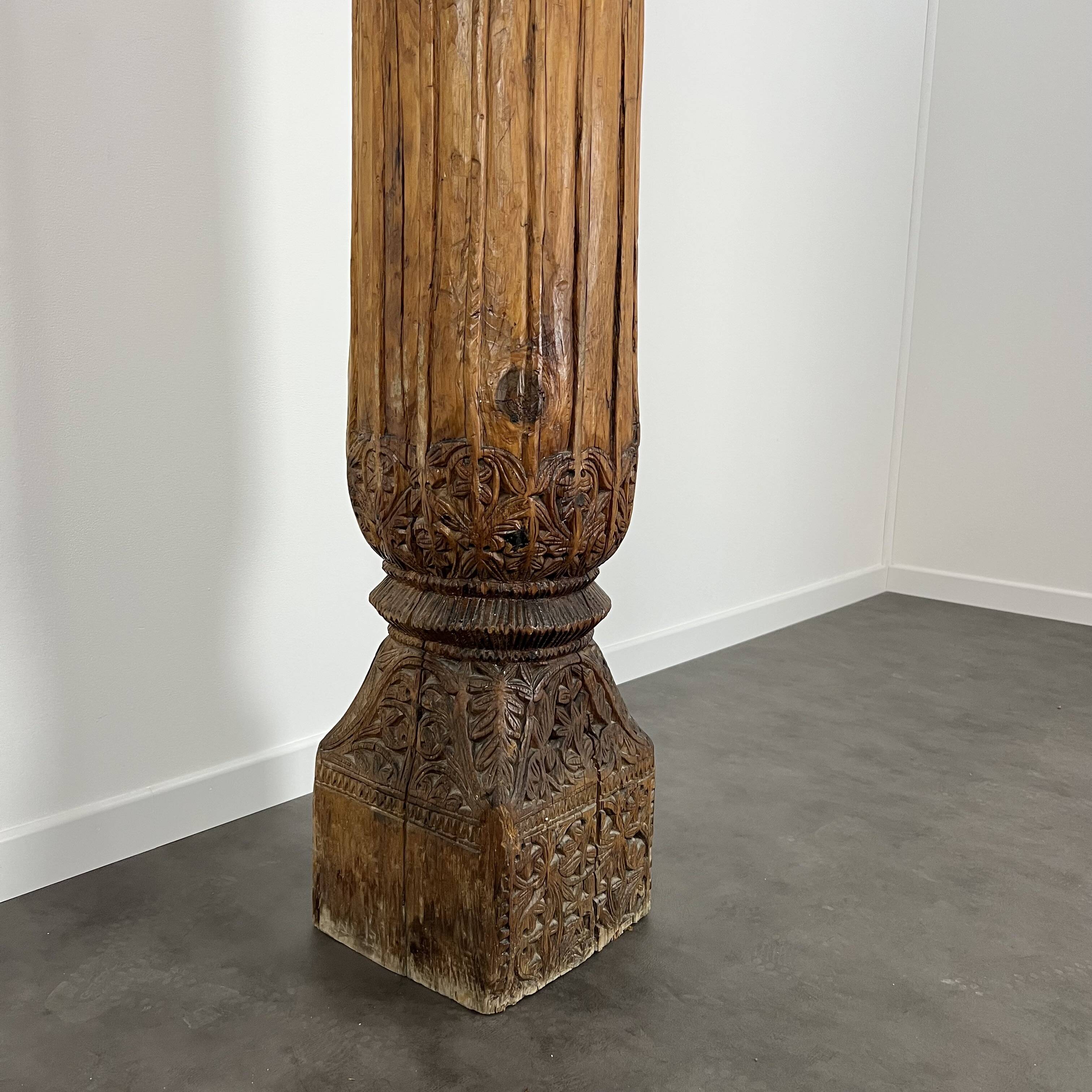 Ancient large carved cedar pillar column from Pakistan, India.