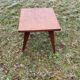 Coffee table of the 50s in blond mahogany inlaid compass feet