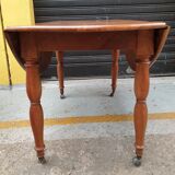 Beautiful old round table with fellers