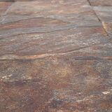 Brutalist coffee table by Adnet