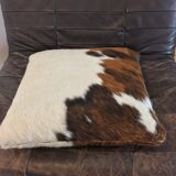 Pouf and cow cushion, leather