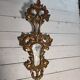 Italian mirror in gilded wood with gold leaf from the 18th century.