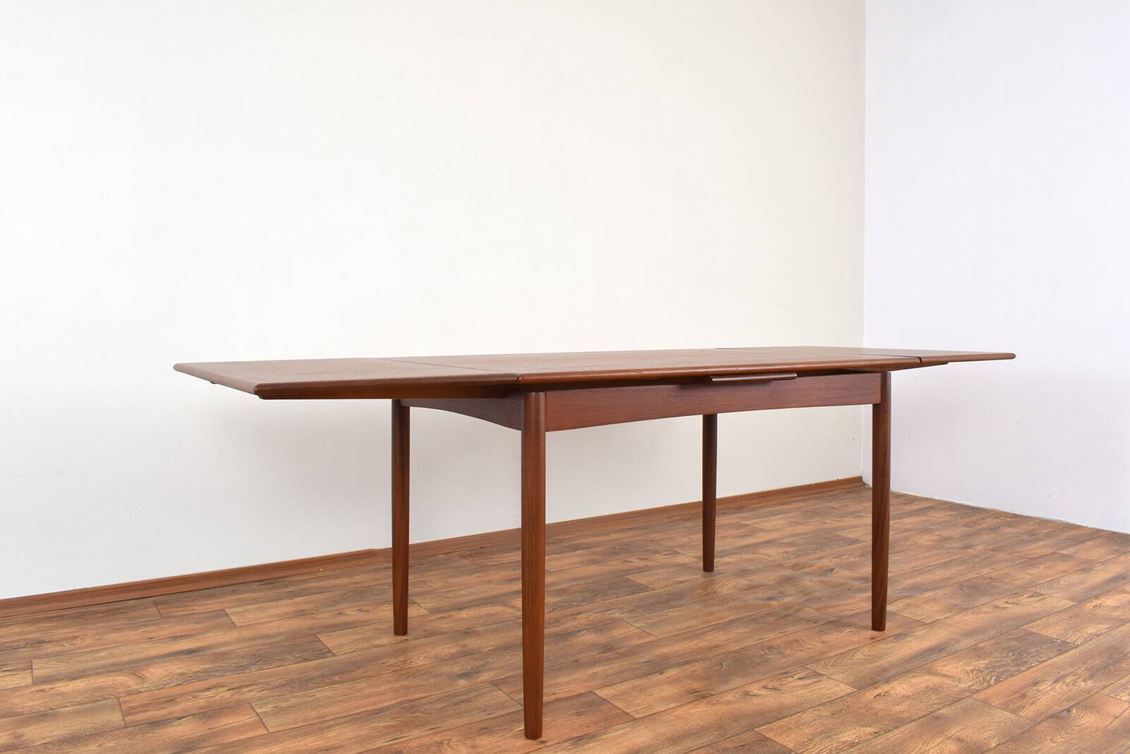 Mid-century Danish teak extendable dining table, 1960s.