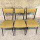 Three vintage chairs in the style of Colette Gueden.