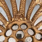 Palm-shaped faceted mirror