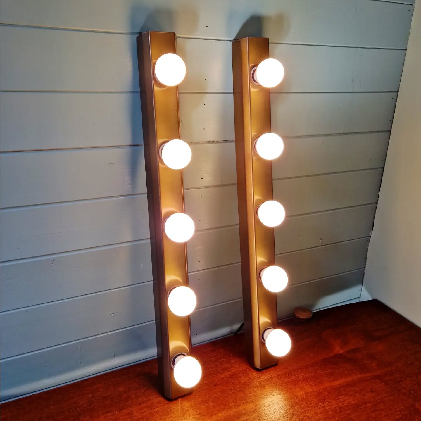 Set of three wall sconces in solid brass, 1970s-80s.