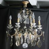 Chandelier hanging from the eighteenth century, Crystal white and amber, bronze and gilded wrought iron