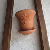 Pair of decorated terracotta wall flower pots