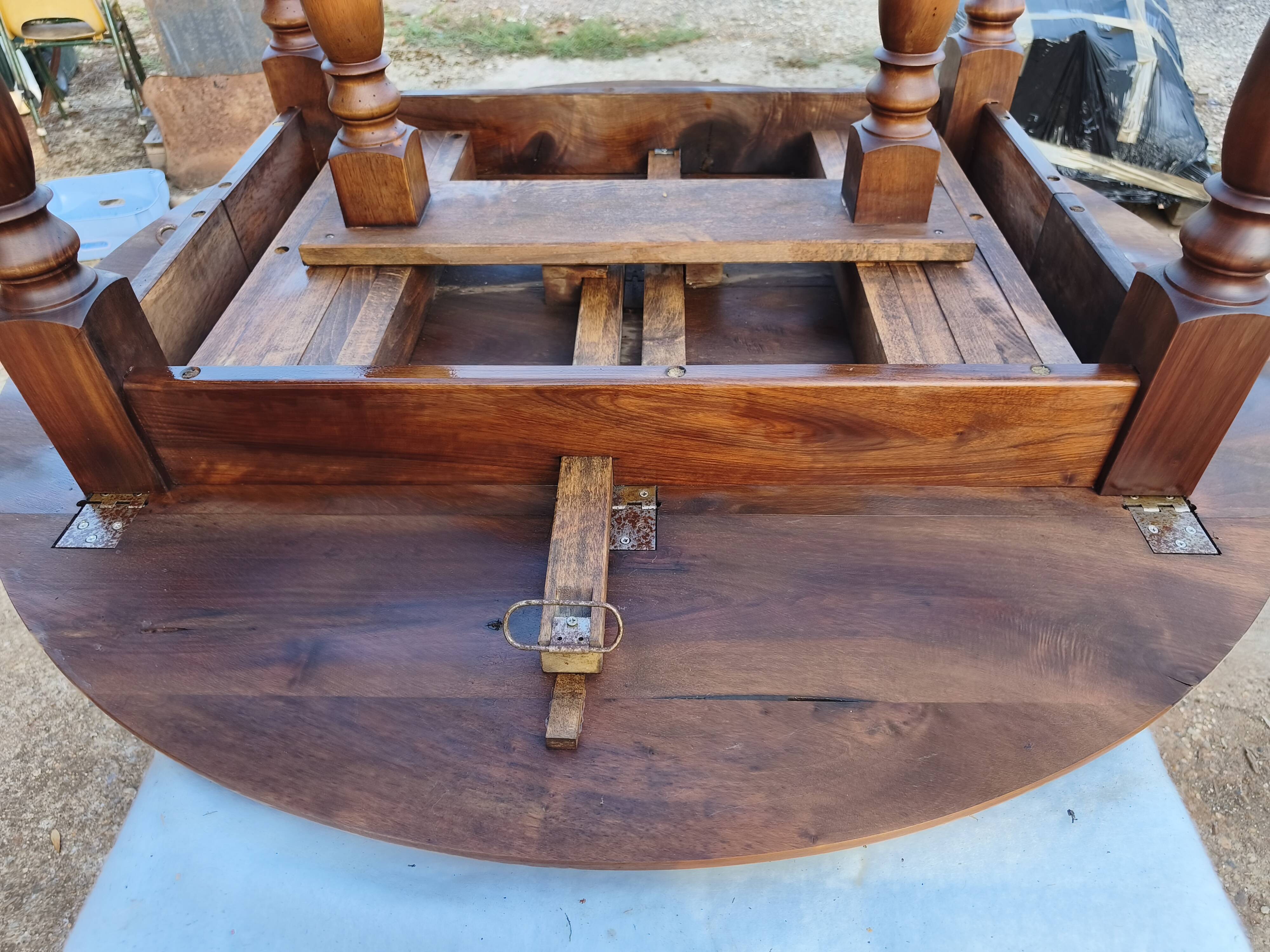 19th-century walnut drop-leaf table.