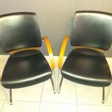 Chairs in leather, walnut and chrome