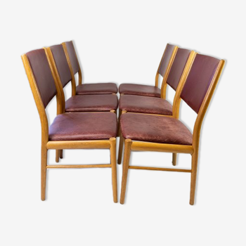 Suite of six chairs in oak and leather