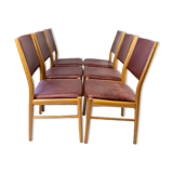 Suite of six chairs in oak and leather