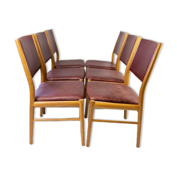 Suite of six chairs in oak and leather