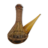 Catalan bottle in amber glass and wicker