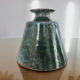 Vase en céramique dans les tons verts