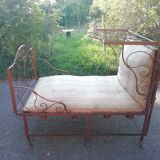Old wrought iron folding bed