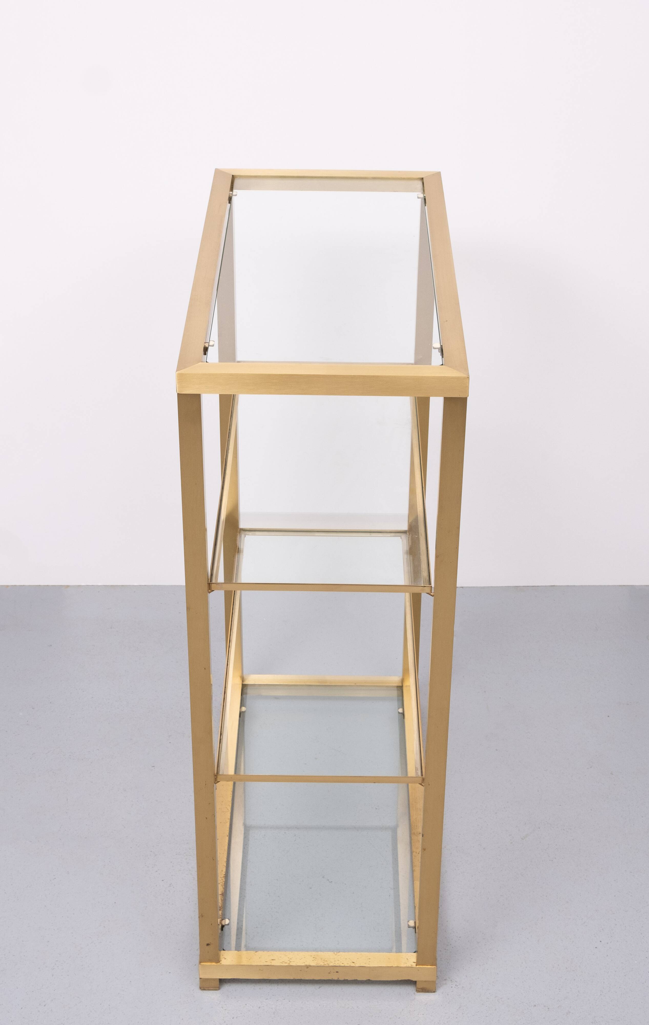 Brass and Glass Etagere or bookcase . Italy 1970s