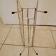 Vintage magazine holder in gold metal