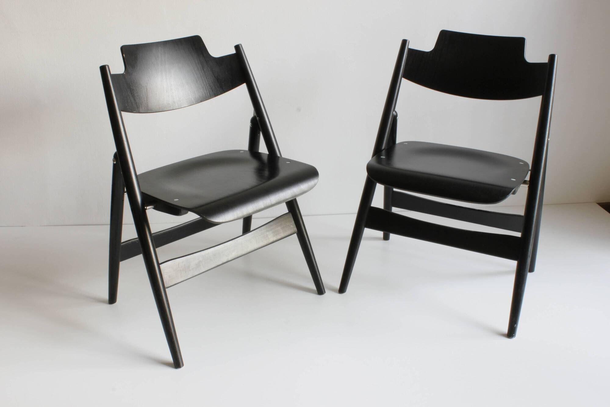 Wooden folding chairs SE18 by Egon Eiermann for Wilde & Spieth, Germany 1952.