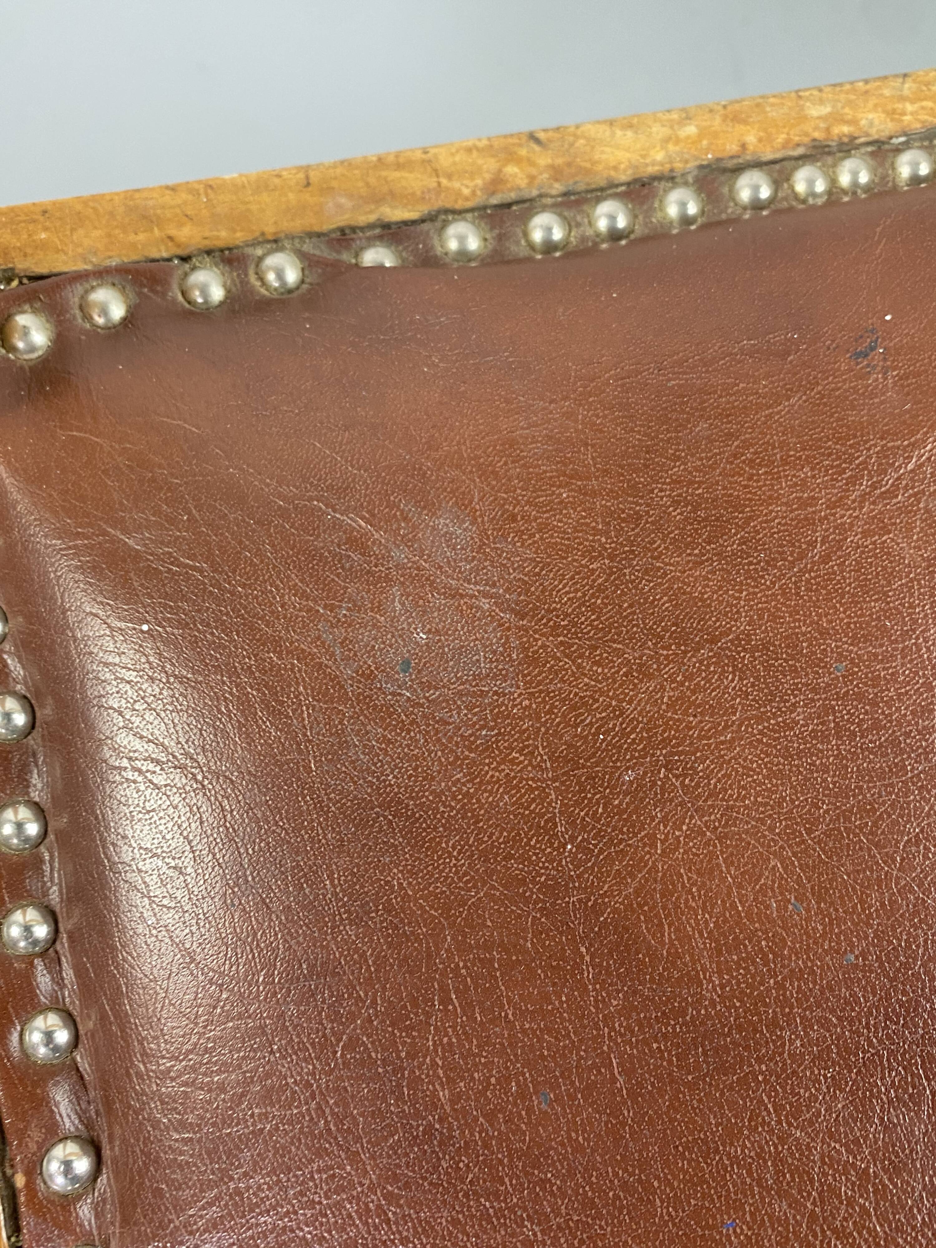 Pair of wooden and leather chairs