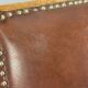 Pair of wooden and leather chairs