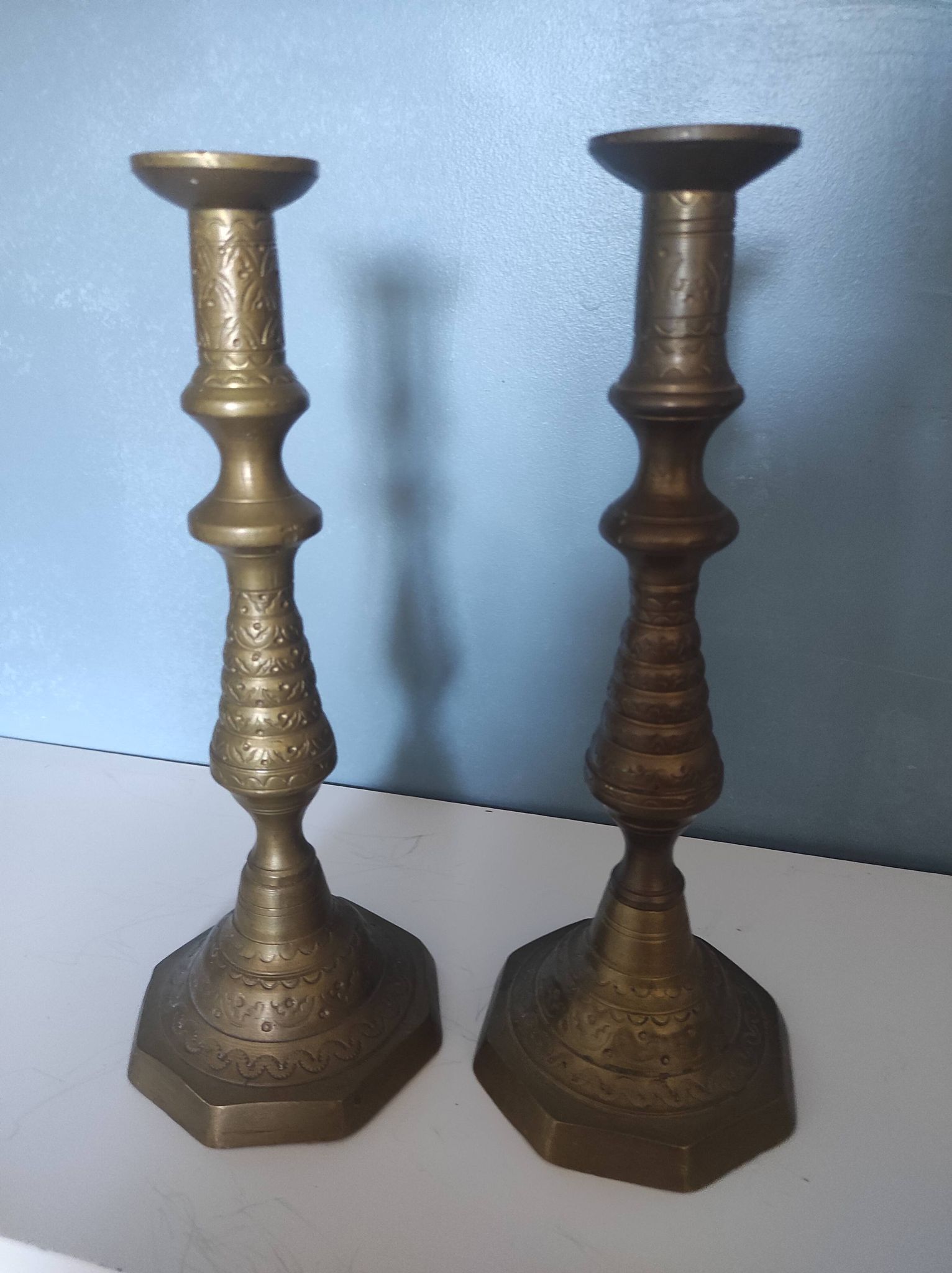 Pairs of Brass Candlesticks, made and cut by hand