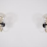 Wall lights with blown glass globes.