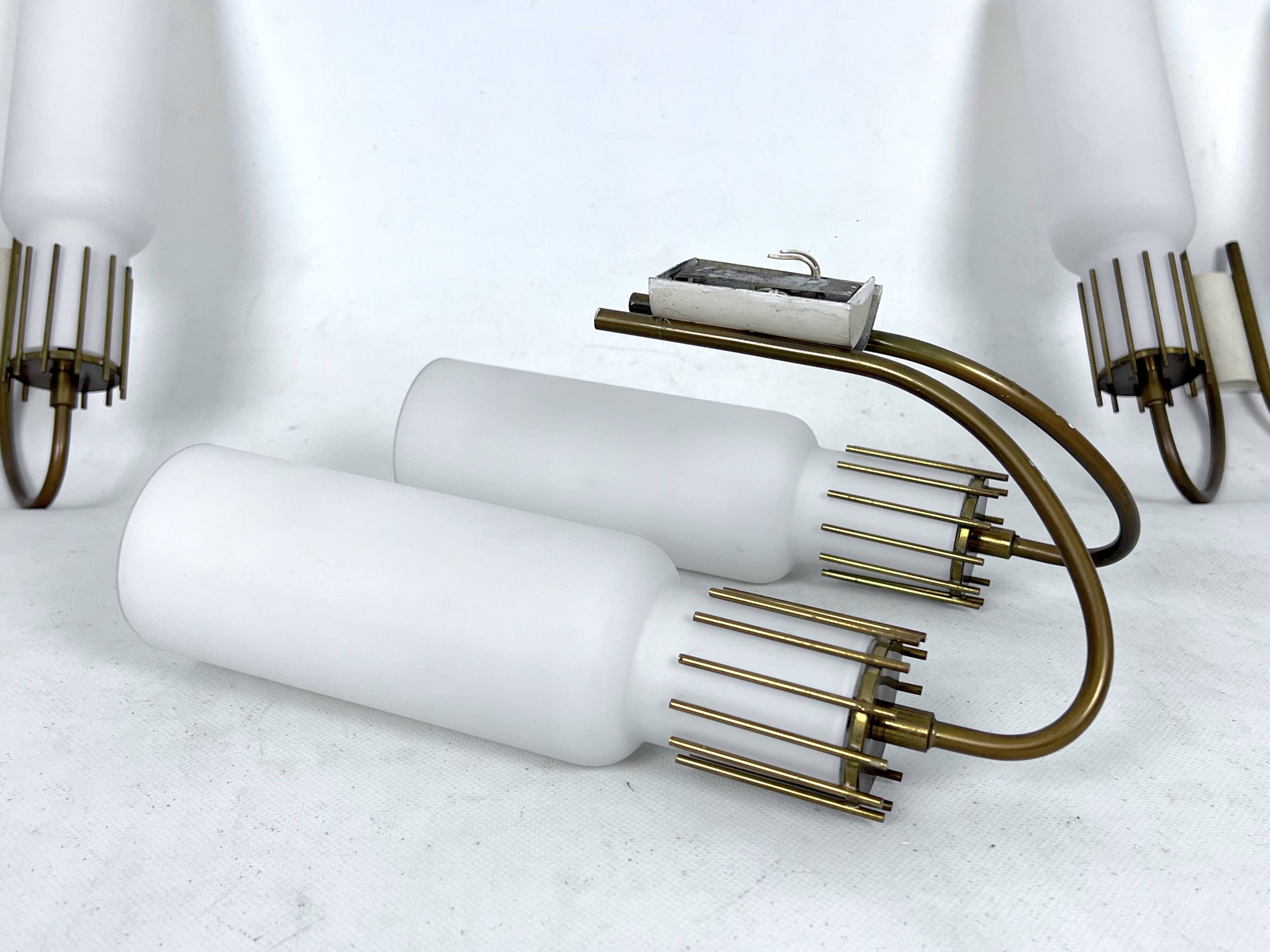 Mid-Century Modern set of three sconces in Arredoluce style. Italy 1950s