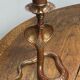 Chiseled brass cobra candlestick