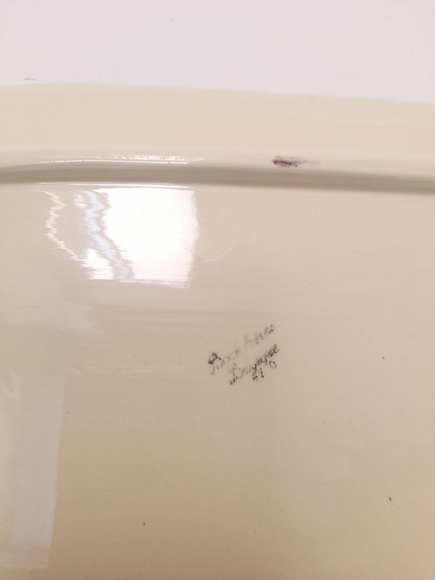 Floral cake dish in Boch brothers earthenware