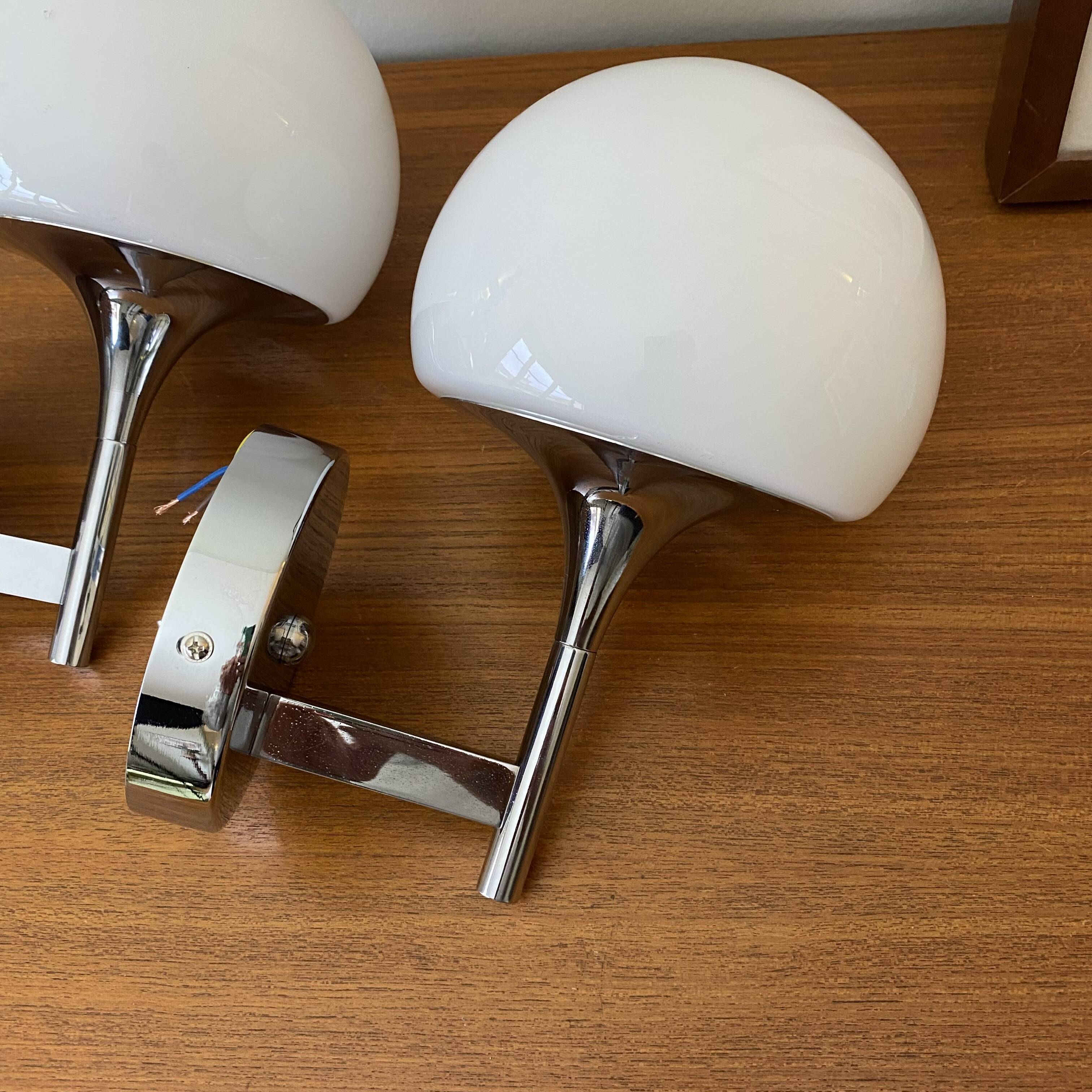 Pair of seventies wall sconces with chrome metal and opaline glass globe.