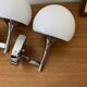 Pair of seventies wall sconces with chrome metal and opaline glass globe.