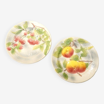 2 Saint Clément slip plates with embossed apple and cherry decoration
