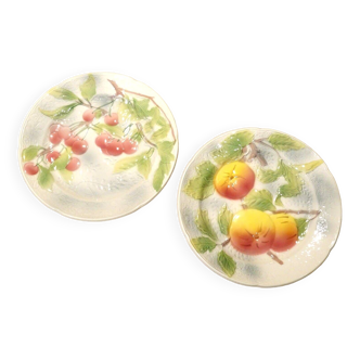 2 Saint Clément slip plates with embossed apple and cherry decoration