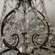 Antique cage chandelier with rock crystal pendants