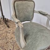 Louis XV style cabriolet armchair in patinated wood and velvet