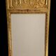 Gilded trumeau in the Louis XVI style with curious decorations.