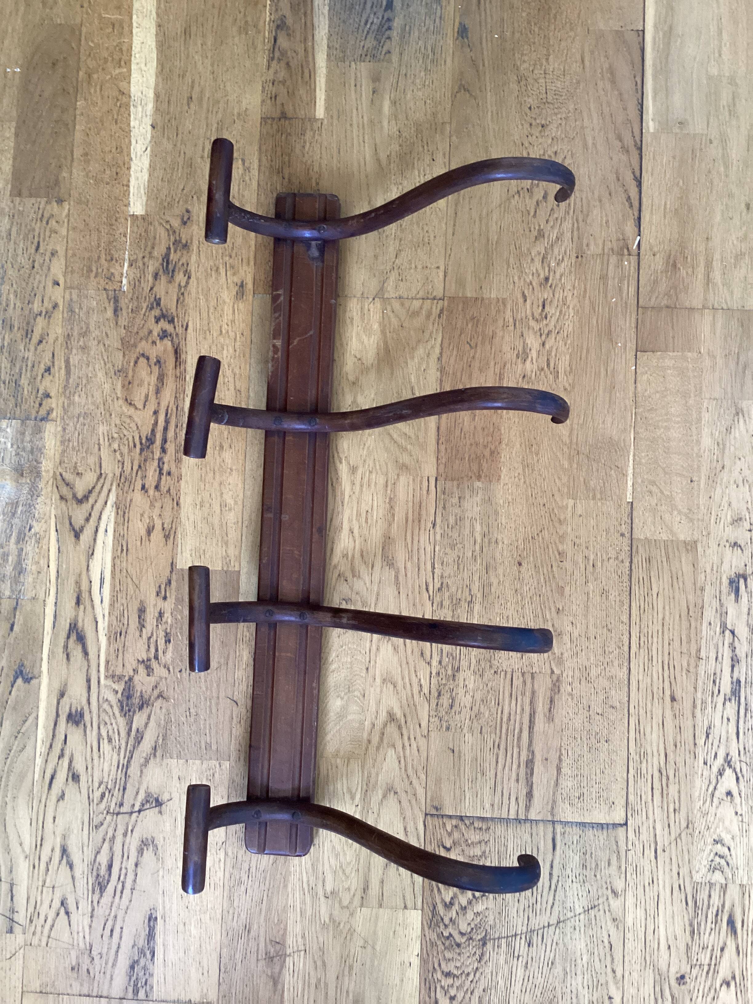 Coat rack signed Thonet with four hooks dimensions: height -32cm - width - 69cm-
