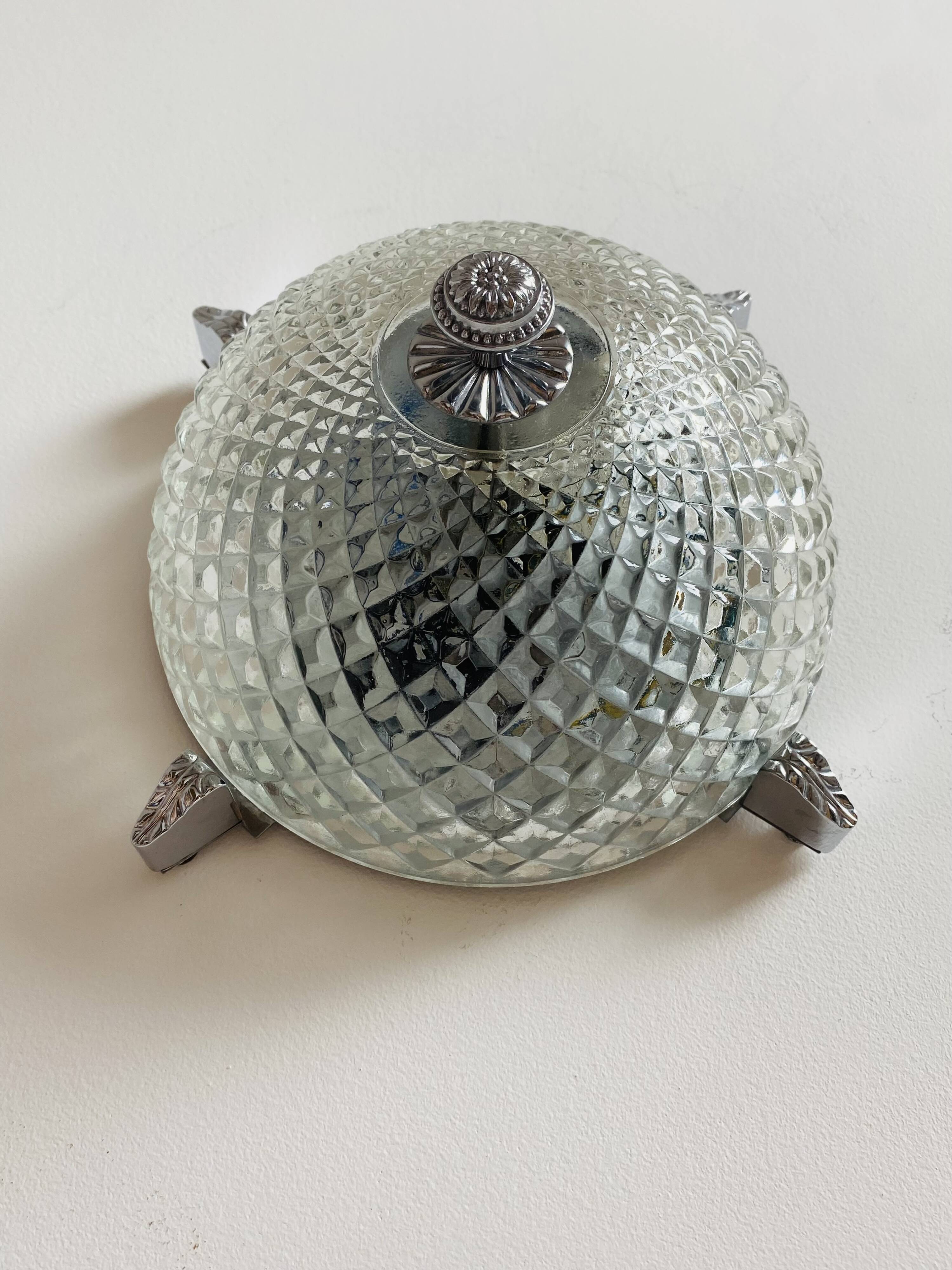 Pair of chrome-plated glass sconces