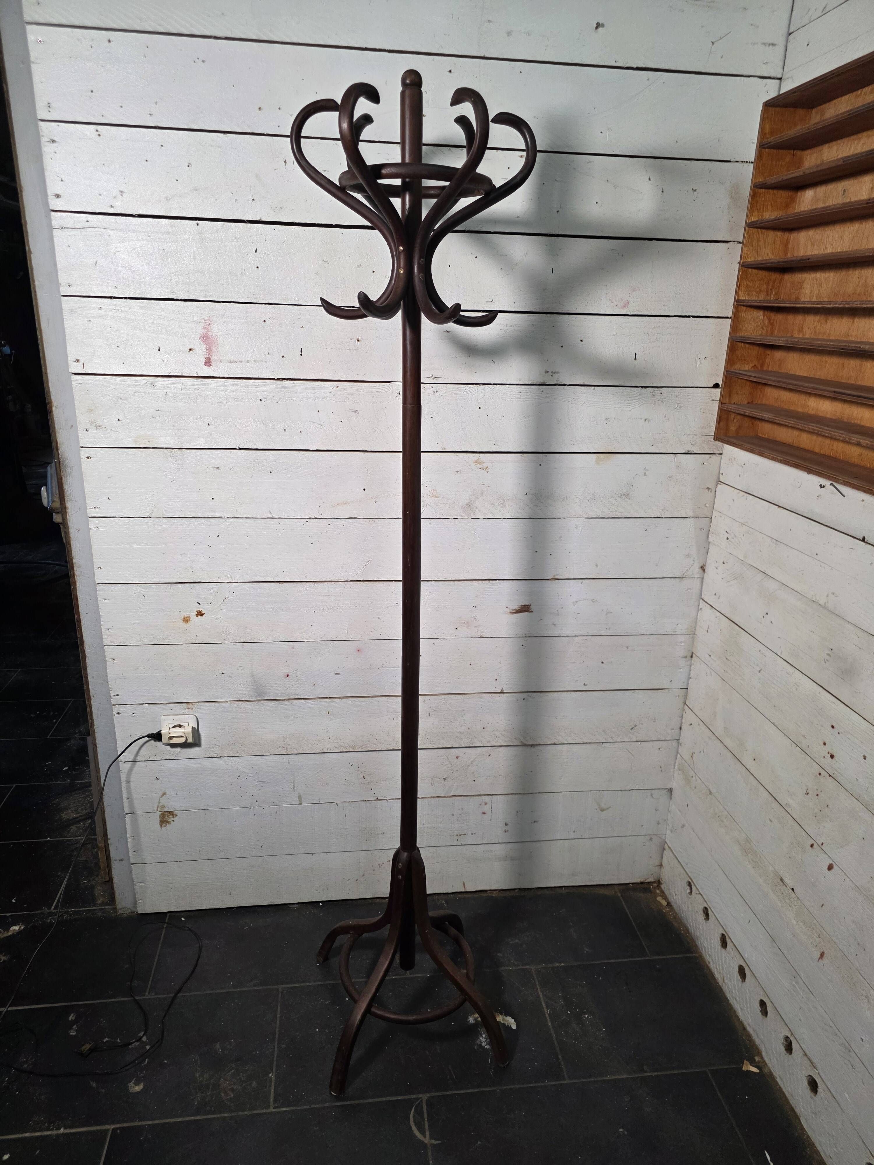 Curved antique wooden parrot