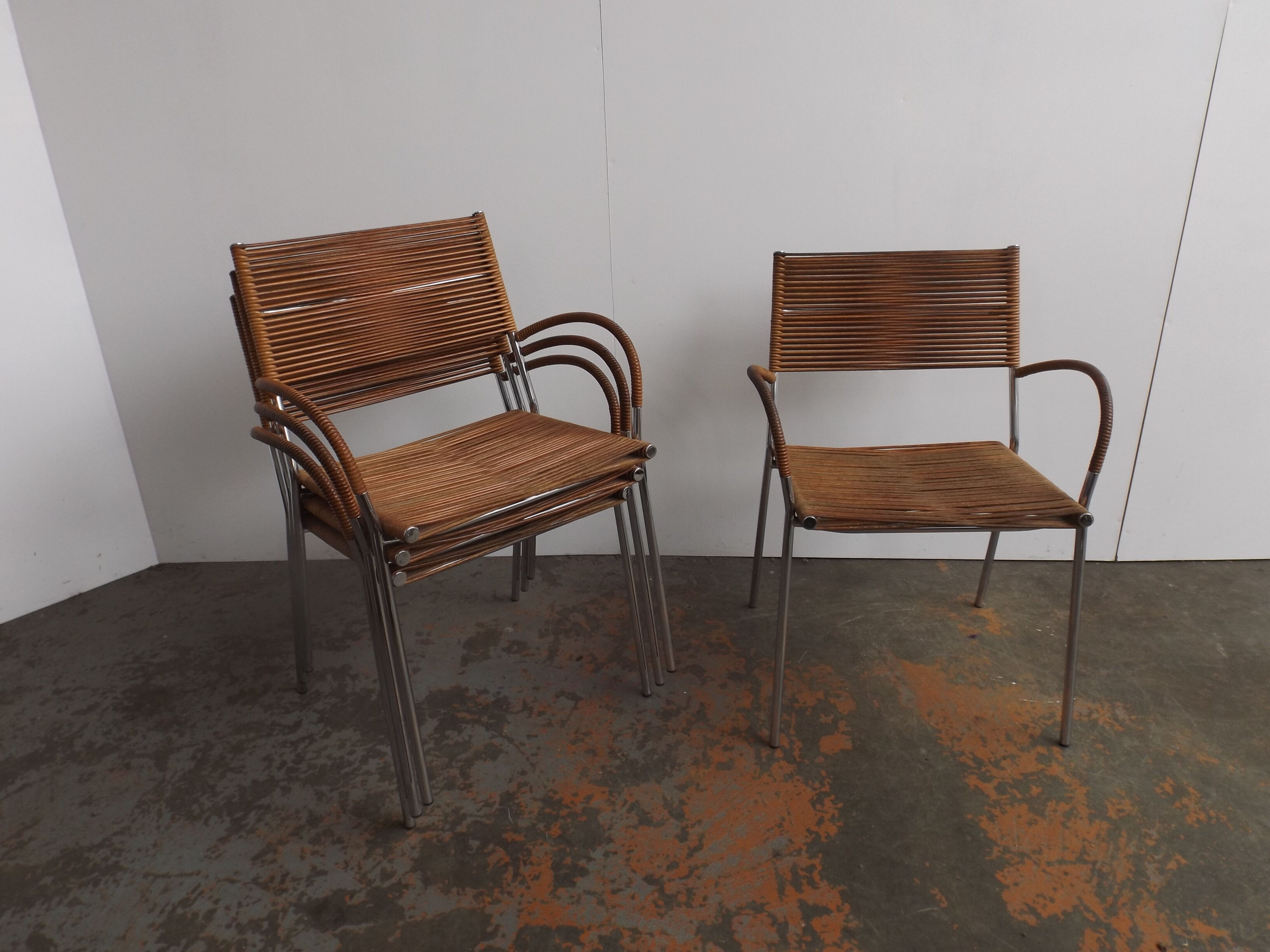 Set of 4 chairs by Tito Agnoli