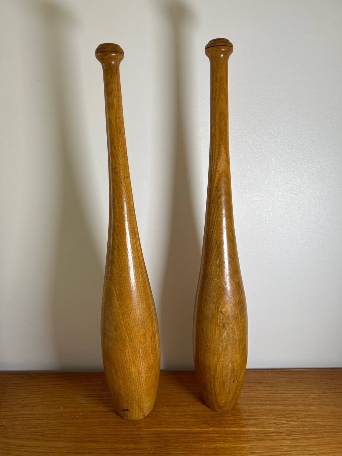 Pair of old juggling clubs