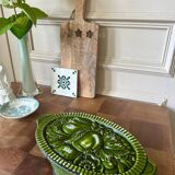 Old enameled cast iron trivet