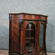 Meuble vitrine Boulle galbé époque Napoléon III en acajou et bois noirci vers 1850