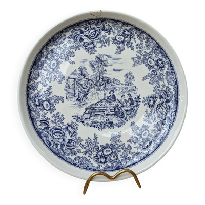 Ancienne assiette en céramique décor scène de vie et floral bleu Van Melle
