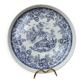 Ancienne assiette en céramique décor scène de vie et floral bleu Van Melle
