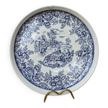 Old ceramic plate with scene of life and blue floral decor Van Melle