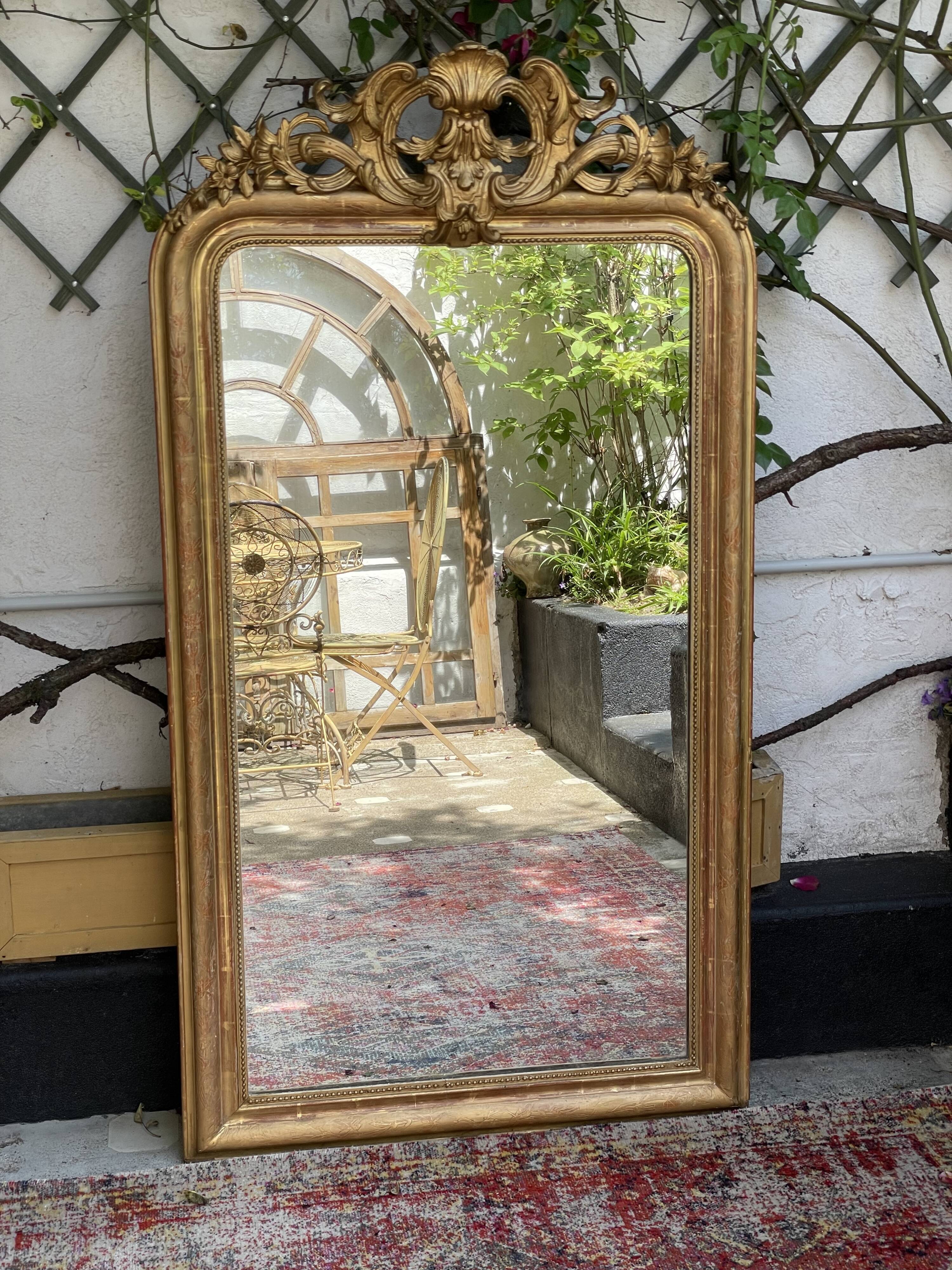 Antique mirror gilded with gold leaf (153x83)