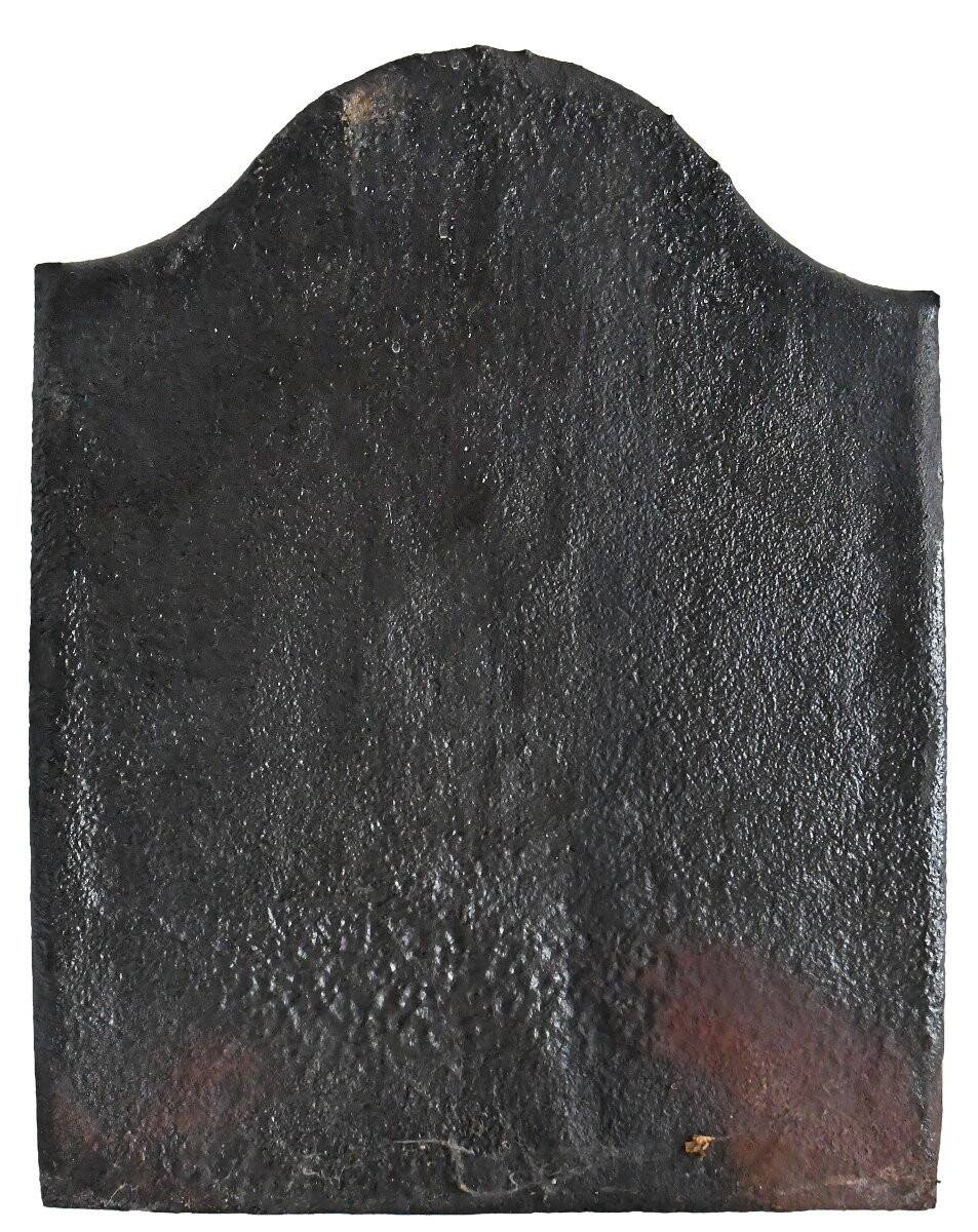 Old cast iron fireplace plaque