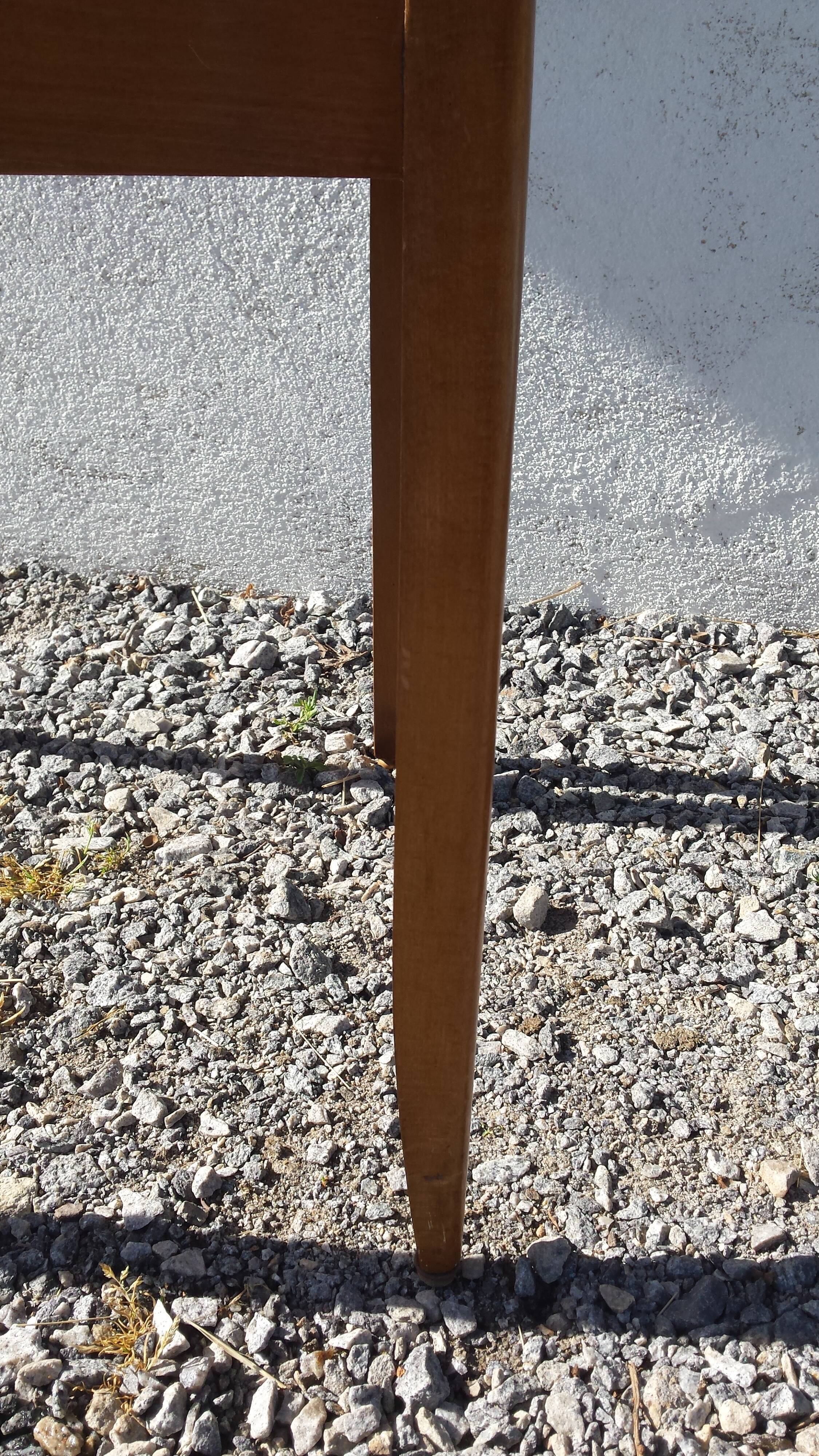 lot of 2 wooden chairs and green velvet